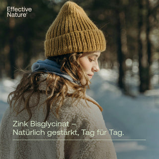 Frau mit gelbem Strickmütze im Schneewald, Effective Nature Zink Bisglycinat Werbemotiv